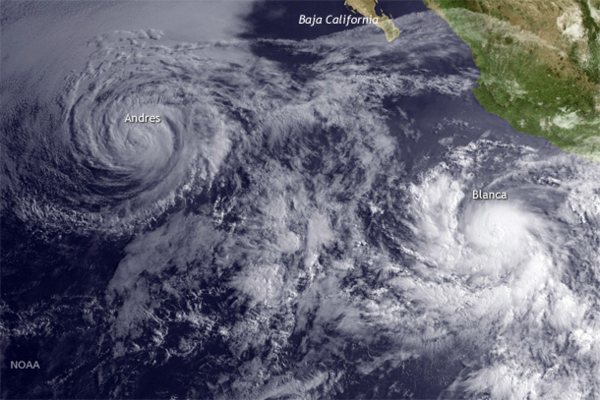 GOES West satellite view of Hurricane Andres (upper left) and
  Tropical Storm Blanca (lower right) on June 2, 2015.
  NOAA image by the Environmental Visualization Lab.